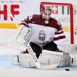 MINSK, BELARUS - MAY 20: Latvia's Kristers Gudlevskis #50 goes down to make the save during preliminary round action against Switzerland at the 2014 IIHF Ice Hockey World Championship. (Photo by Andre Ringuette/HHOF-IIHF Images)
